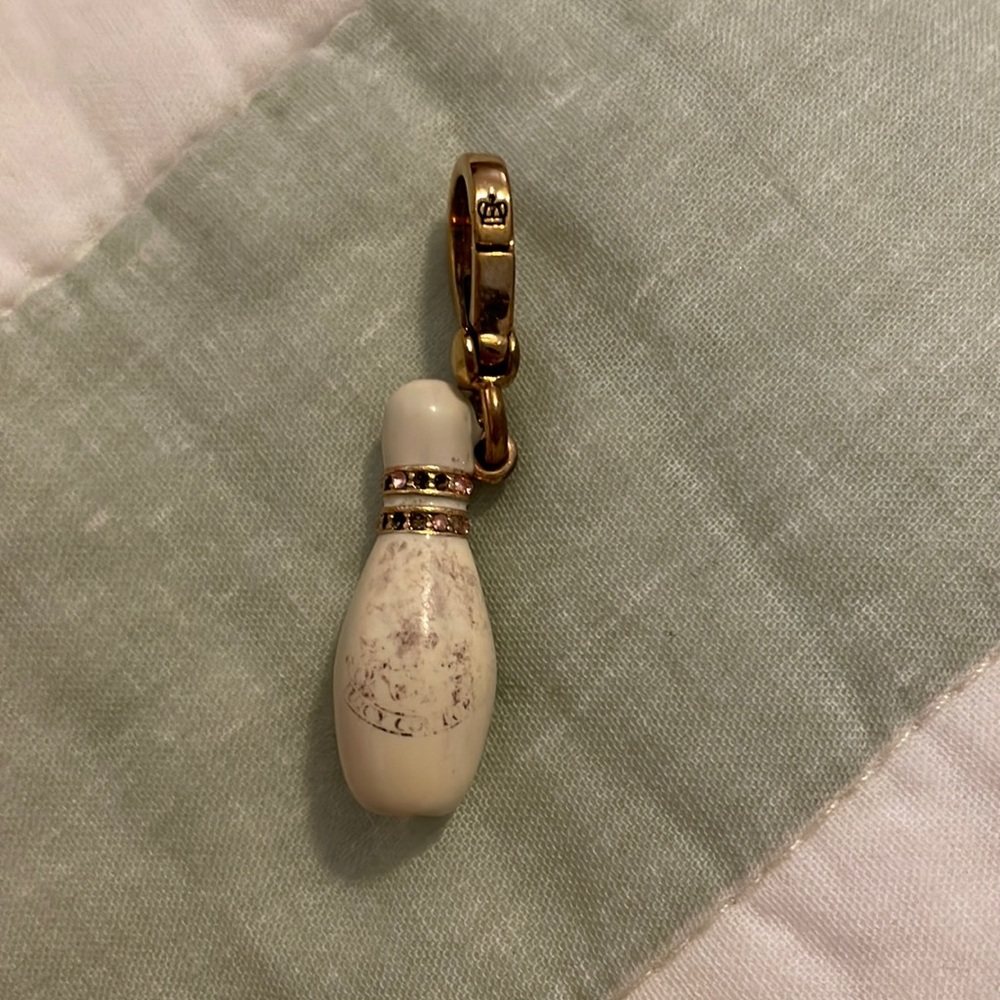 Bowling pin charm for JC.  The JC emblem is slightly fading…
